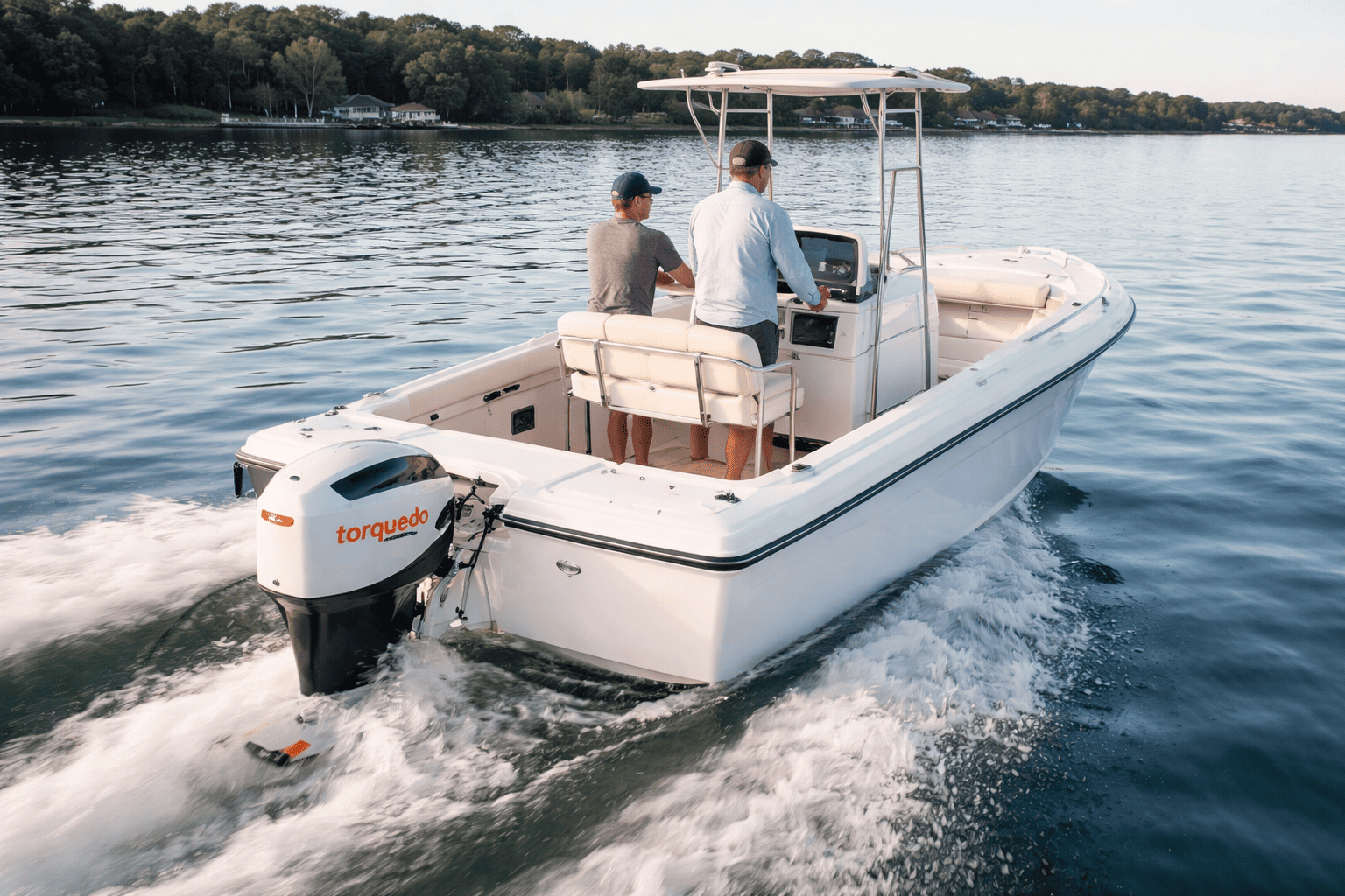 Boat powered by Torqeedo electric outboard motor on calm water — zero-emission electric outboard motors for sale at Boat Engine LLC New York