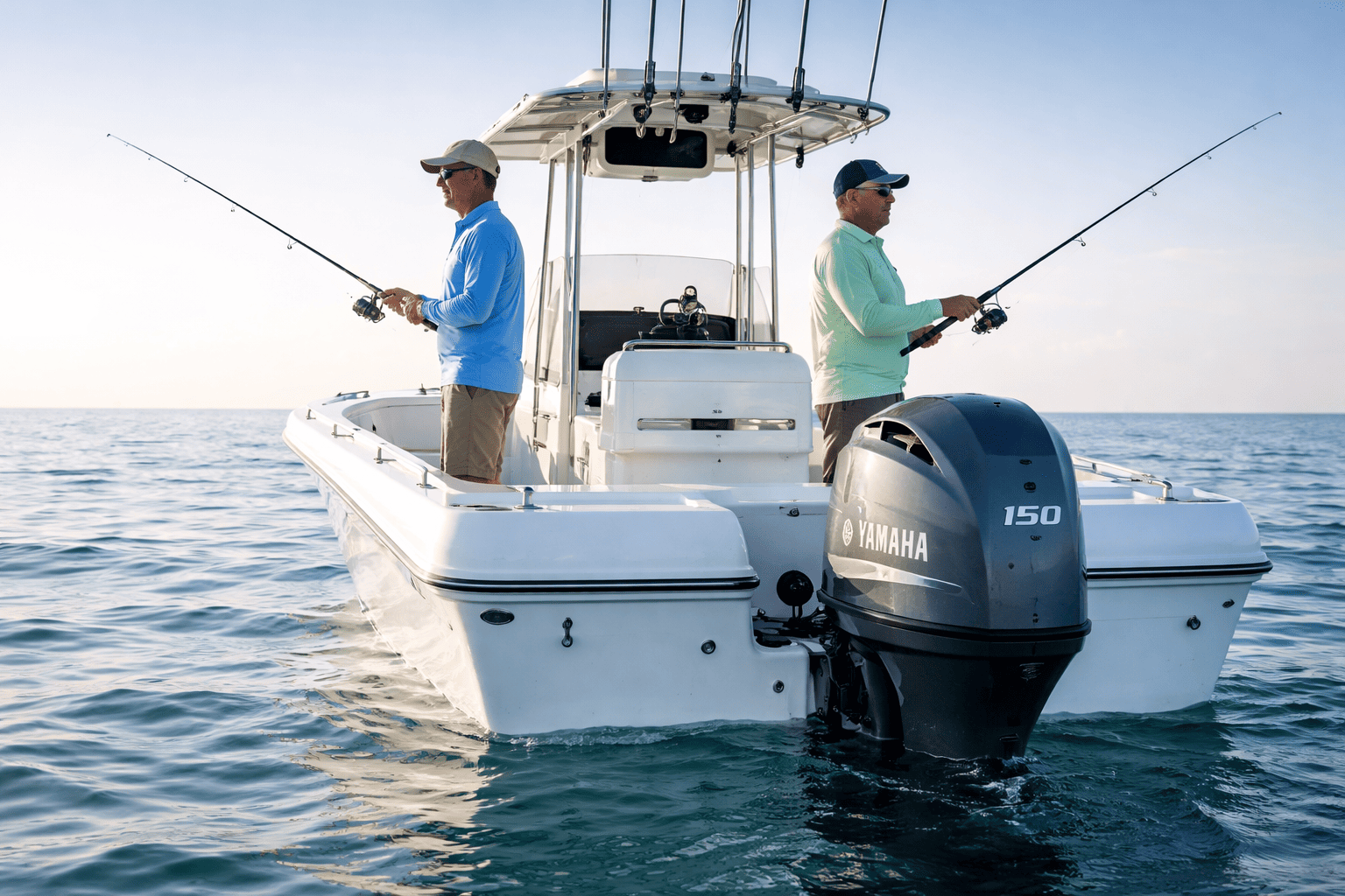 Two anglers fishing from center console boat with Yamaha midrange outboard — shop Yamaha midrange outboards at Boat Engine LLC
