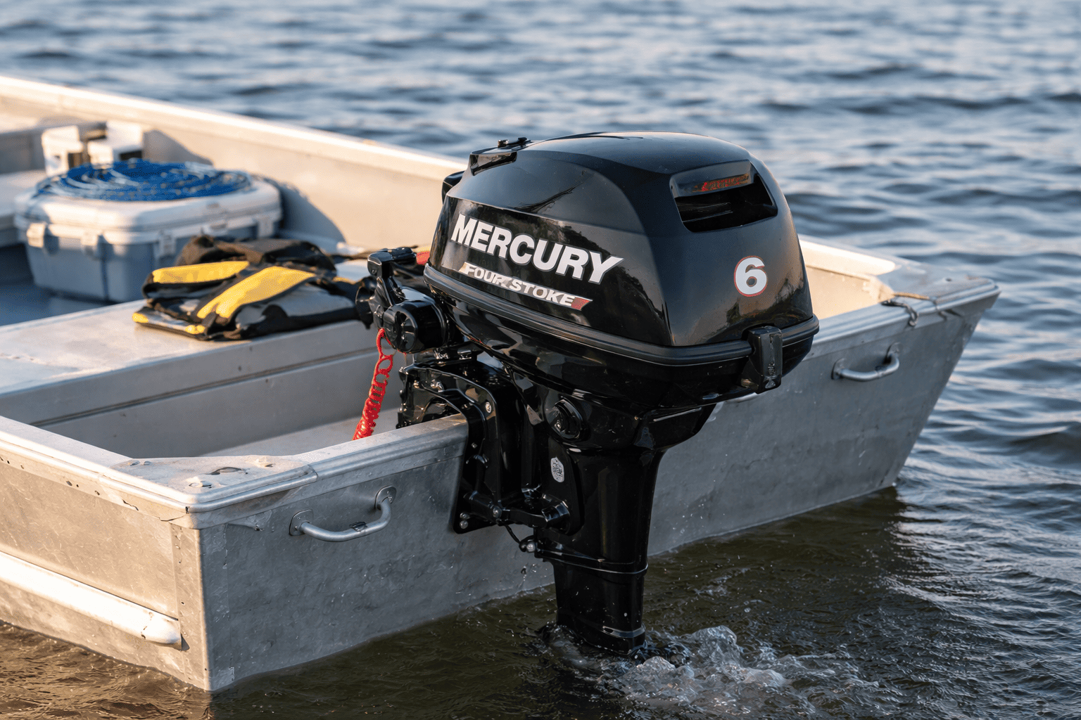 Mercury portable FourStroke outboard motor on small boat — shop Mercury portable outboards at Boat Engine LLC New York