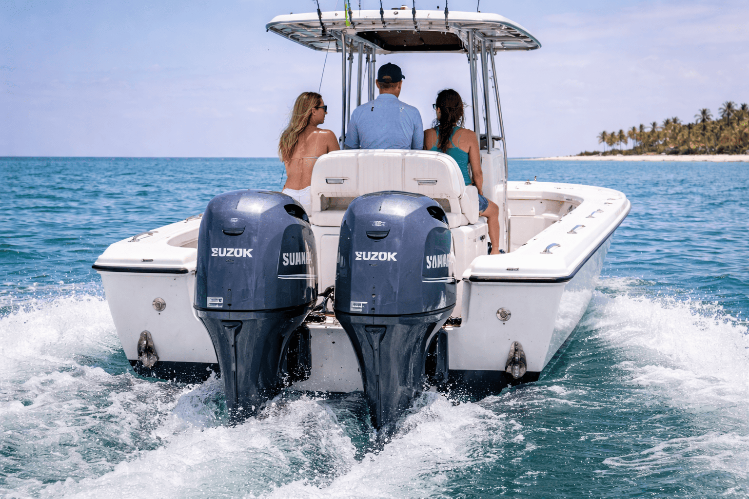 Twin Yamaha 200 HP In-Line 4 outboard motors on a center-console boat — Yamaha In-Line 4 outboards for sale at Boat Engine LLC